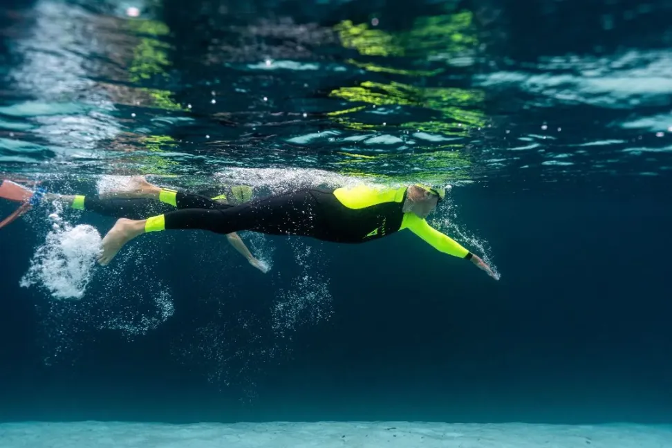 Photo of swimmer in a lake at K'gari Island