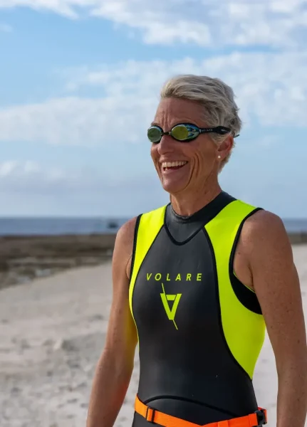 Photo of Allison Zillman, owner and director of Swim Tours Australia, wearing goggles and wetsuit on Lady Elliot Island.